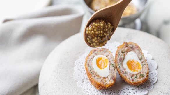 A 'spent salami scotch egg' with charcuterie offcuts and soft-yolked quail egg.