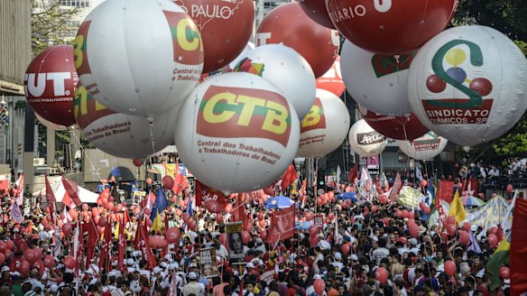 A sea of red: A demonstration in favour of Brazil's President Dilma Rousseff and the ruling Workers' Party (PT) in Sao Paulo on March 18.