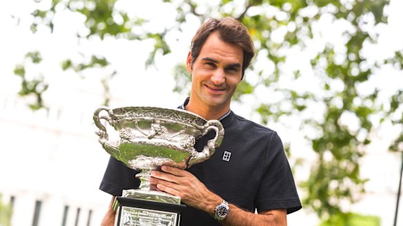 Roger that: Roger Federer with the trophy on Monday.