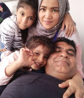 Gurdip Singh, whose life was spared at the last minute, with his family. 
