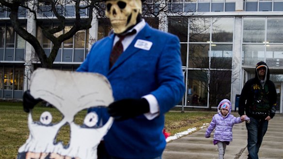 Flint residents protest outside City Hall.