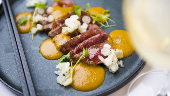 Vindaloo steak tataki, soy smoked egg yolk, pickled baby lotus root. 