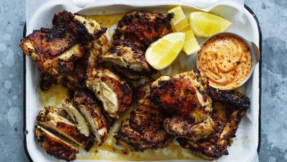 Barbecued chicken thighs with spicy mayo.