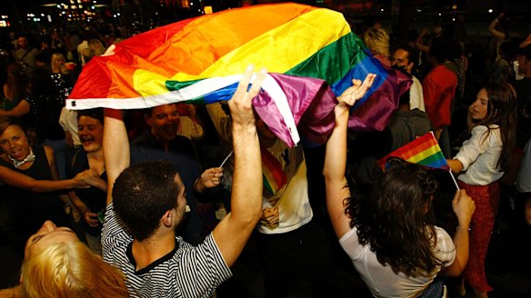 Supporters of same-sex marriage are seen celebrating at a street party and march in Sydney.
