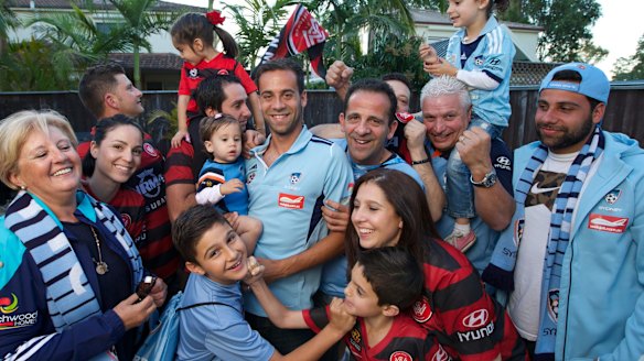  Bossley Park boy and Sydney FC captain Alex Brosque, centre, with his family.