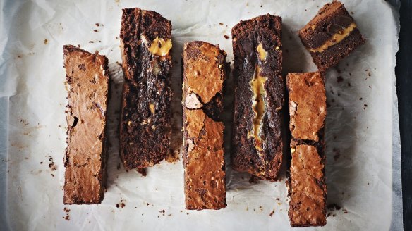 Fudgy caramel-centred brownies with their tell-tale crisp outer shell.