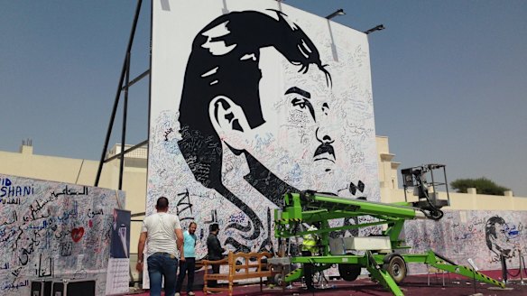 A black-and-white depiction of Qatar's emir, Sheikh Tamim bin Hamad Al Thani.