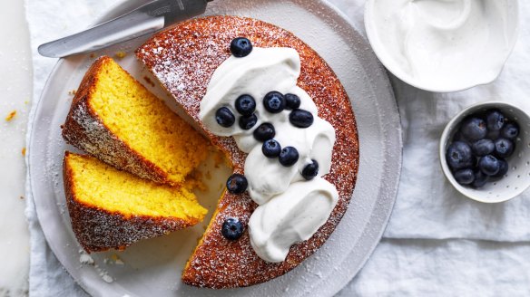 Fresh corn and coconut cake served with coconut yoghurt and blueberries.