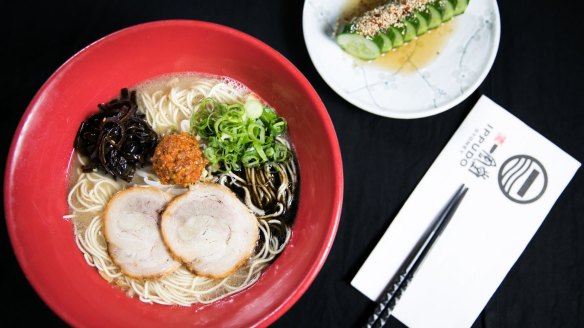 IPPUDO's famous Shiromaru Motoaji (ramen), and Spicy Goma Q (cucumber dish).