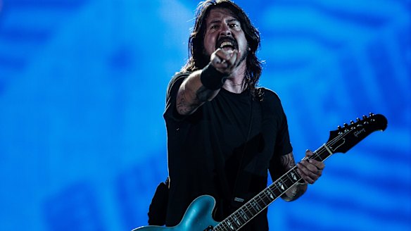 Foo Fighters frontman Dave Grohl on stage during his band's 'Sonic Highways' tour at Etihad Stadium on Saturday night.