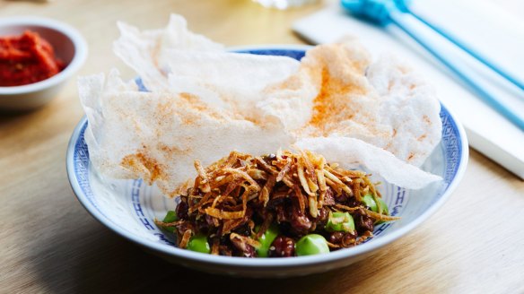 Beef tartare with rice crackers.