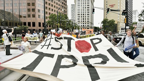 No deal: Protesters in Atlanta, Georgia, express opposition to the Trans-Pacific Partnership.