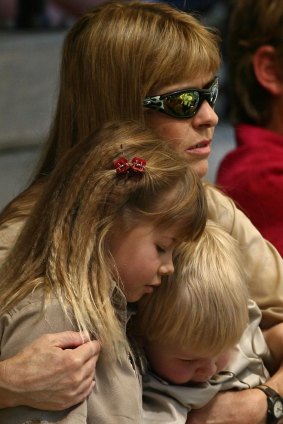 Terri Irwin with daughter Bindi and son Robert watching the Steve Irwin memorial service at Australia Zoo in 2006.