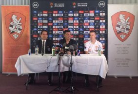 New beginnings: John Aloisi flanked by Brisbane Roar chairman Chris Fong and midfielder Matt McKay.