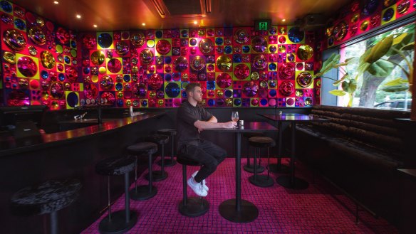 The pub's gaudy interior features 1800 wall-mounted glass domes.