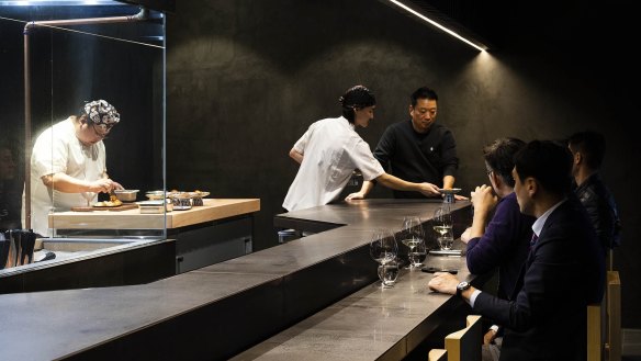 The food is centred around an elevated, glass-encased version of the traditional Japanese sunken fireplace.
