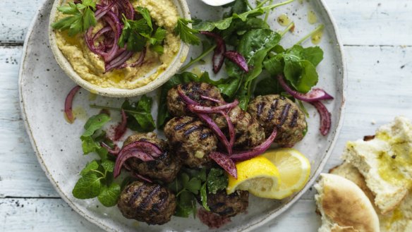 Neil Perry's lamb meatballs with onion salad and hummus.