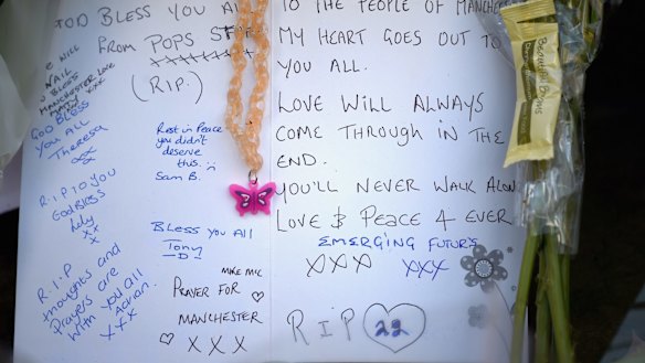 Tributes left in central Manchester on Tuesday.