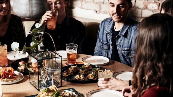 Dining at the Duke Rooftop bar.