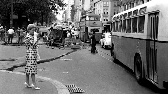 Workmen were constantly employed ripping up Sydney's disused tram tracks and repairing the streets afterwards.