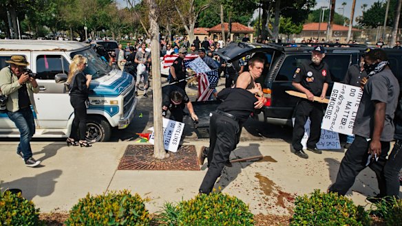 Members of the KKK try to start an anti-immigration rally.