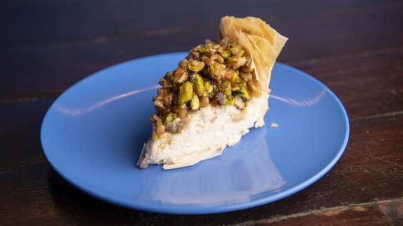 A slice of not-so-traditional baklava cheesecake.