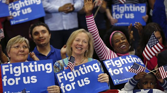 Supporters of Hillary Clinton cheer her victory.