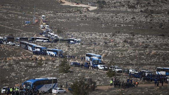 Israeli security forces arrive to evacuate the settlement.