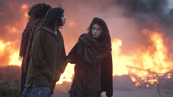 Israeli settlers burn tyres and block an entrance ahead of the upcoming eviction of the settlement of Amona in the Israeli-occupied West Bank. 