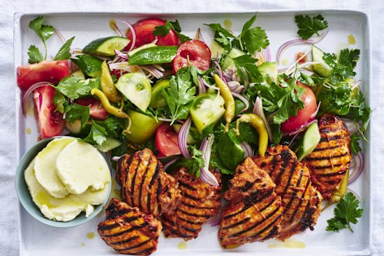 Garlicky grilled chicken with a simple salad.