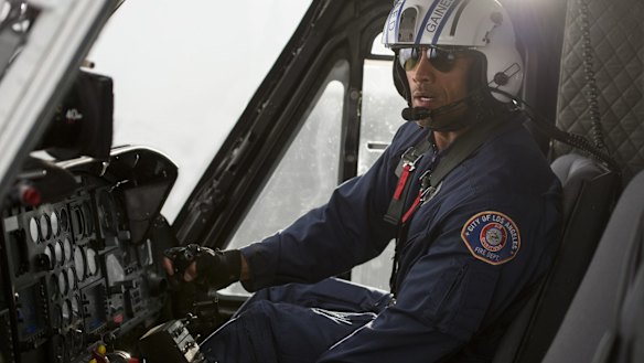 Dwayne Johnson at the controls of the CareFlight Bell 412 in San Andreas.