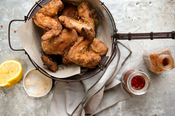 Buttermilk fried chicken with hot sauce.