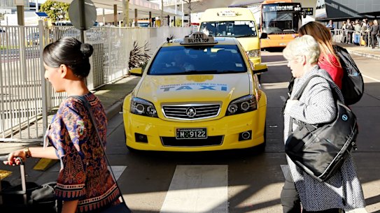 Taxi drivers are angry about the decision to allow UberX wait-zones at Melbourne Airport.