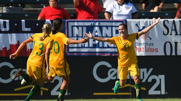 Record breaker: Lisa De Vanna celebrates during Australia's win over Brazil.