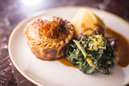 Beef and Guinness pie with buttered cabbage and silverbeet and mashed potato ticks all the pie boxes.