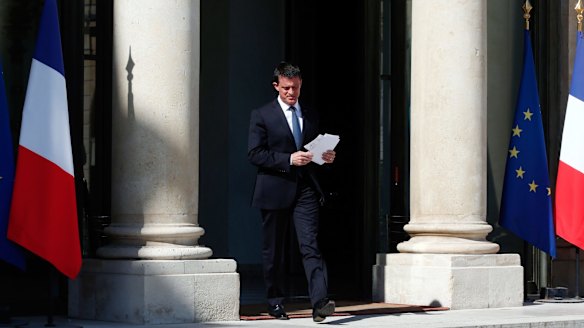 French Prime Minister Manuel Valls arrives to speak to media after a security meeting at the Elysee Palace, in Paris, on Friday.