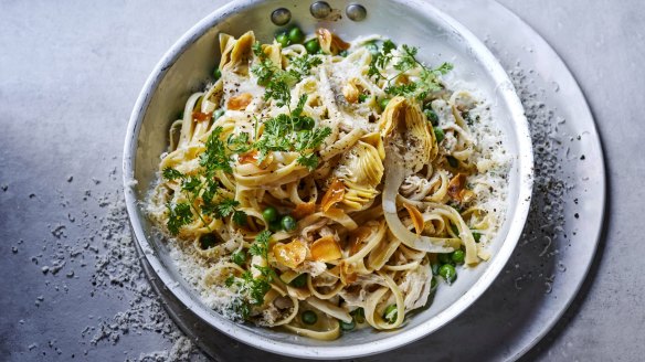 Fast chicken ragu pasta with artichokes and peas.