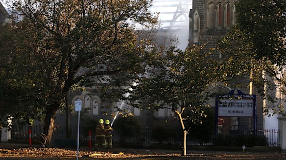 Firefighters battle the blaze at  St James Church in Brighton.