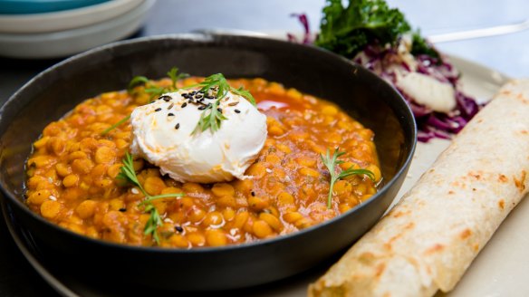 The chana dal brekkie bowl with coconut roti, slaw and poached egg at Two Chaps.