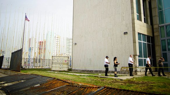 Personnel of the American Embassy in Havana inspect the damage caused by Hurricane Irma's powerful waves and storm surge to the embassy property. 