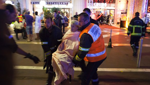 A victim is given medical assistance at Casino Du Palais De La Mediterranee, in Nice on Thursday.