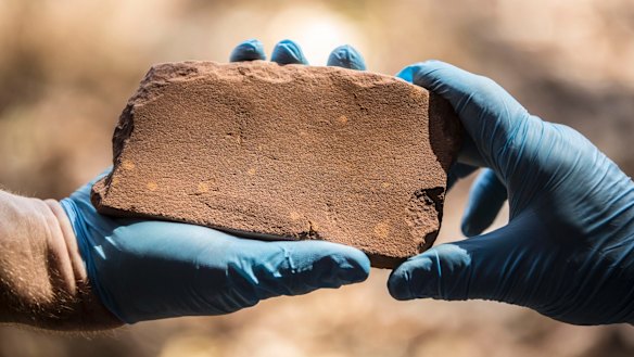 The discovery of this axe sharpening stone inside the Kakadu National Park has rewritten the history of Australia. 