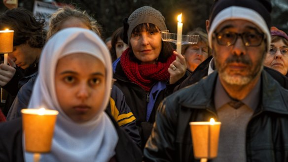 Melburnians at the Light the Dark: Melbourne says Welcome candlelight vigil for refugees at Treasury Gardens on Monday night.