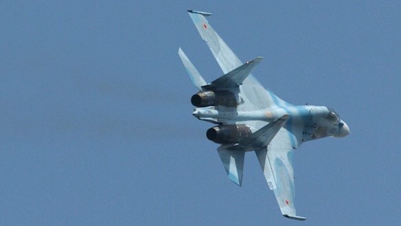 A Russian Sukhoi SU-30 fighter. In recent weeks, Russia has deployed more than two dozen fighter aircraft, attack helicopters and surface-to-air missile defence systems to a base in Syria, according to US officials.