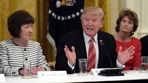 US President Donald Trump, centre, meets with Republican senators on healthcare in June, Republican Senator Susan Collins, left, argues that the legislation is too hard on Americans.