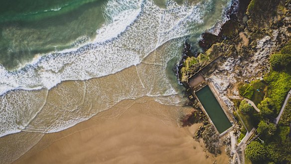 The beach and sea baths of Yamba Main Beach.