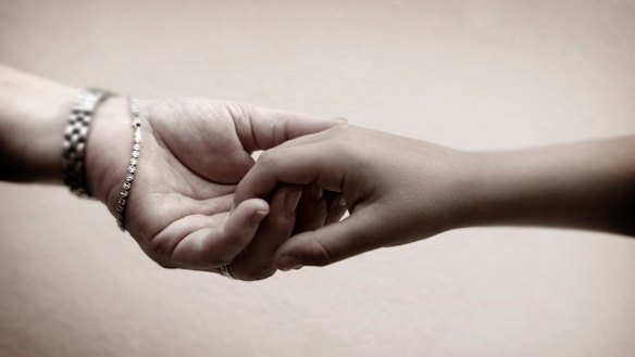 ''Touching another person is the most elementary thing,'' Kate Holden writes to her son.