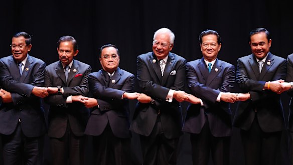 ASEAN leaders: from left, Cambodian Prime Minister Hun Sen, Brunei's Sultan Hassanal Bolkiah, Laos' PM Thongsing Thammavong, Malaysian PM Najib Razak, Vietnamese PM Nguyen Tan Dung and Thai PM Prayut Chan-o-cha.