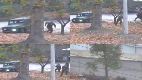 A North Korean soldier running from a jeep and then shot by North Korean soldiers in Panmunjom, North Korea as he flees for the South in November. 
