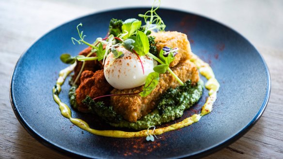 Dinner for breakfast: Mac 'n' cheese with poached egg, croquette and paprika-dusted smoked cauliflower.